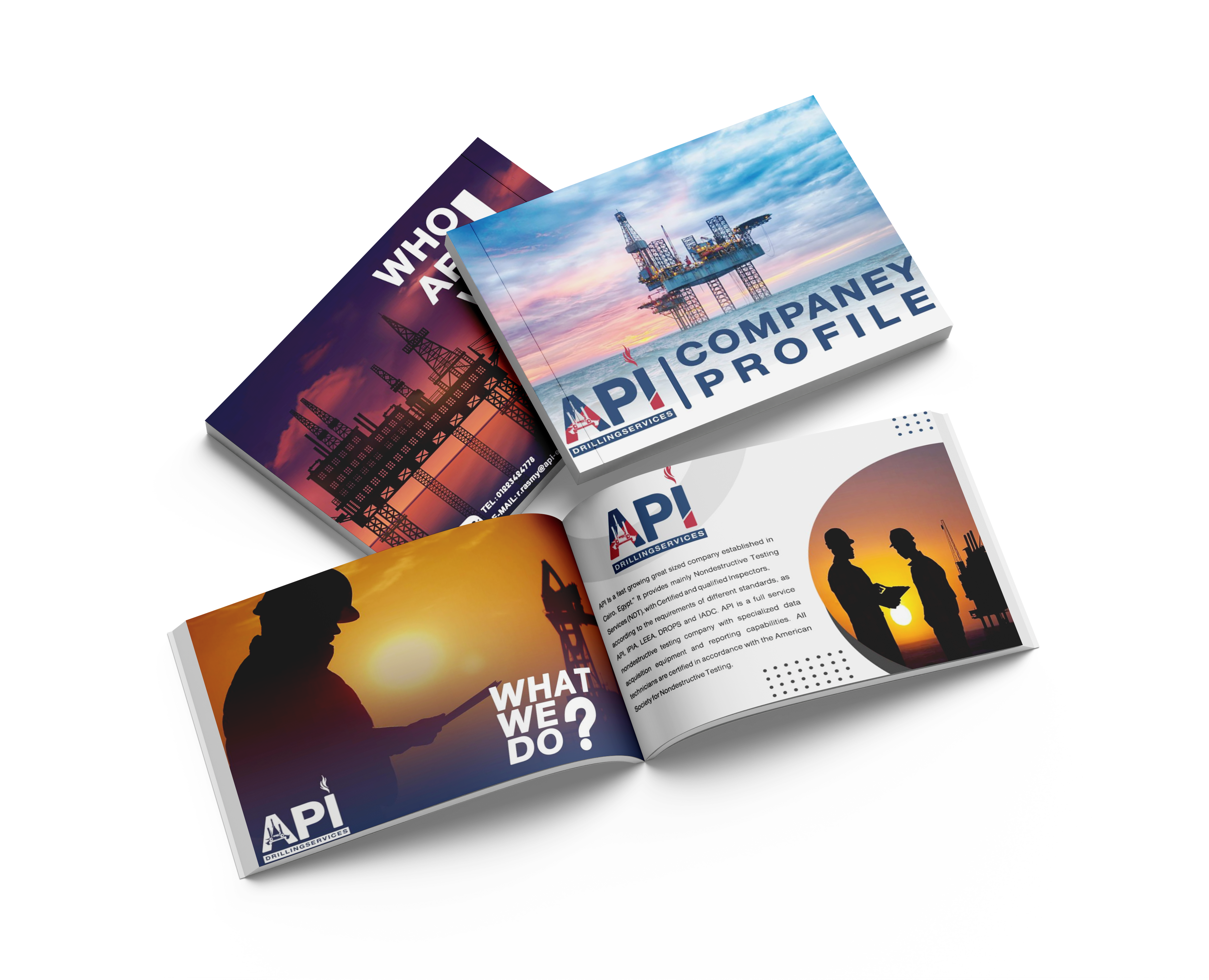 A set of open brochures showcasing various aspects of a company profile, including images of oil rigs and silhouettes of workers